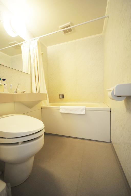 Beppu Station Hotel Quarto foto