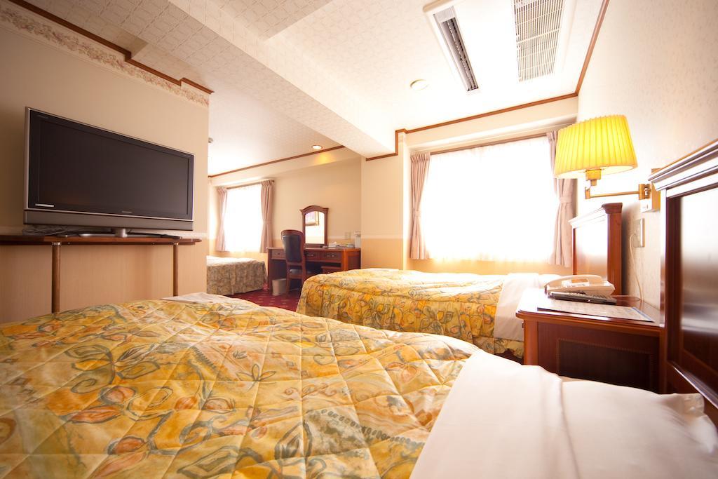 Beppu Station Hotel Quarto foto